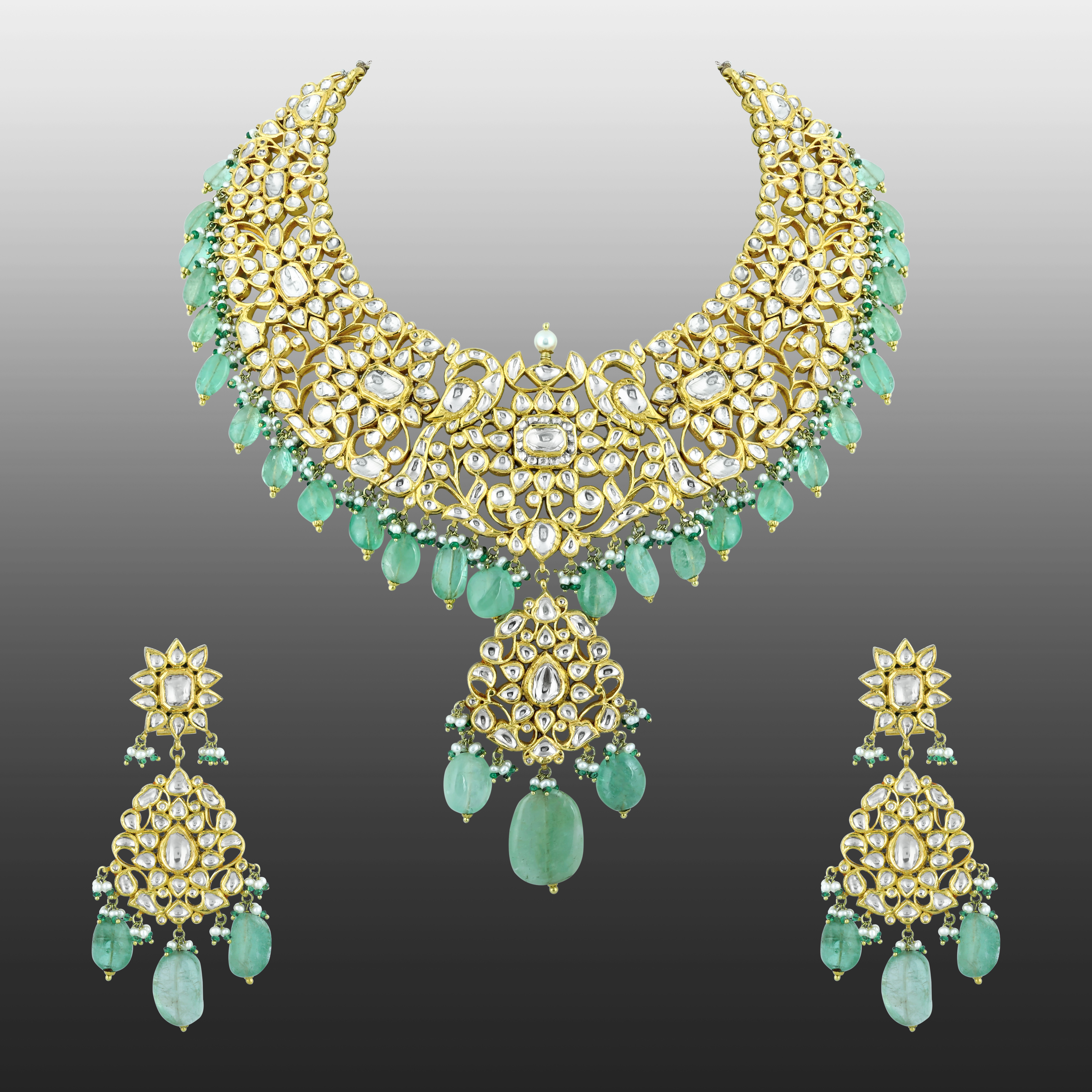 Polki Necklace Set with Gold Detailing and Emerald Drops